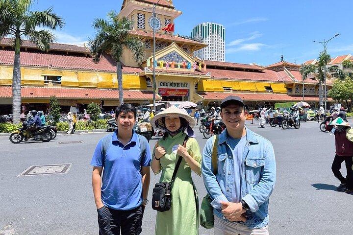 Saigon Morning City Historical Scooter Tour w Ao Dai Rider option