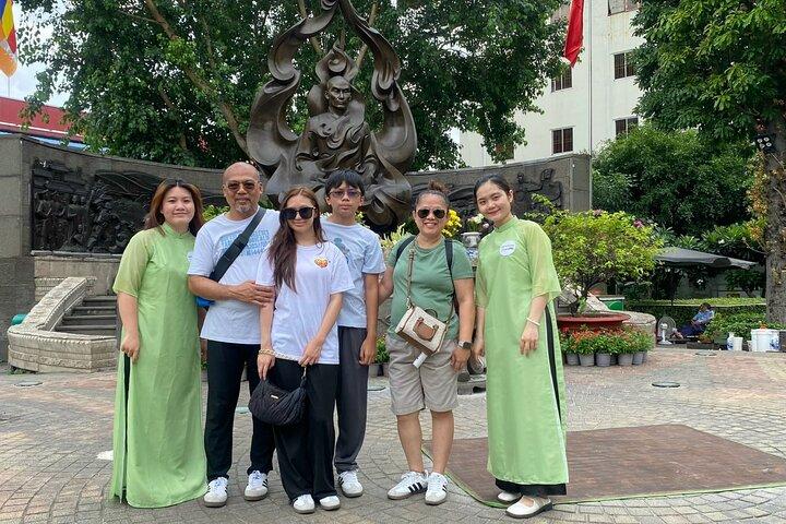 Saigon Morning City Historical Scooter Tour w Ao Dai Rider option