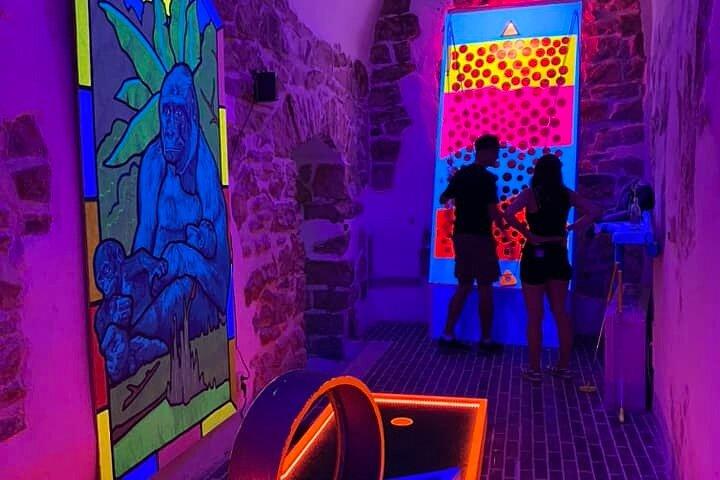 Prague Black Light Mini Golf and Games with free Drinks