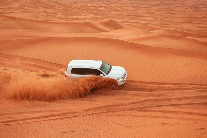 Red Dunes Morning Safari: Dune Bashing, Camel Ride & Quad Biking