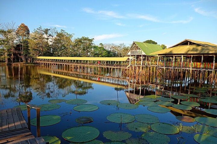 Sunset on the Amazon with fishing and pink dolphin search