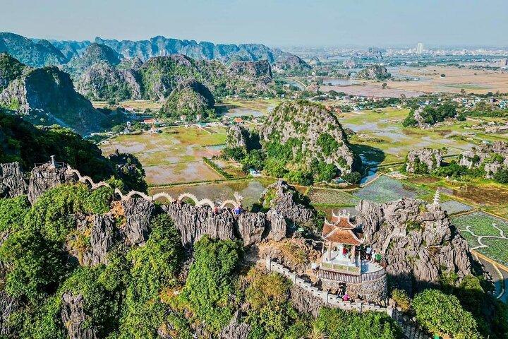 Ninh Binh Discovery: Limousine, Swimming, Biking, Sunset Party