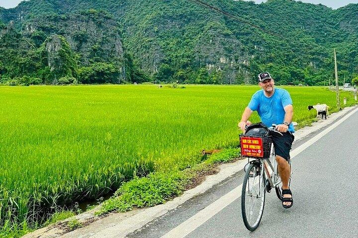 Ninh Binh Discovery: Limousine, Swimming, Biking, Sunset Party