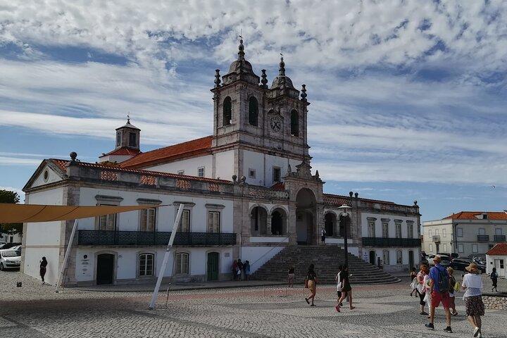 One Way Private Tour Lisbon to Porto via Obidos Nazare and Fatima