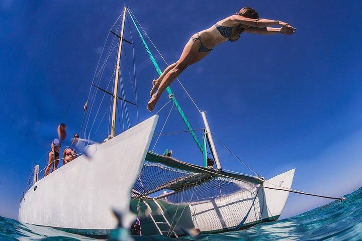 Discover Isla Mujeres: Catamaran, Snorkeling, and "Ice Bar"