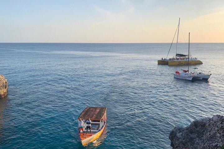 Bamboo Rafting, Catamaran Party Cruise and Ricks Cafe