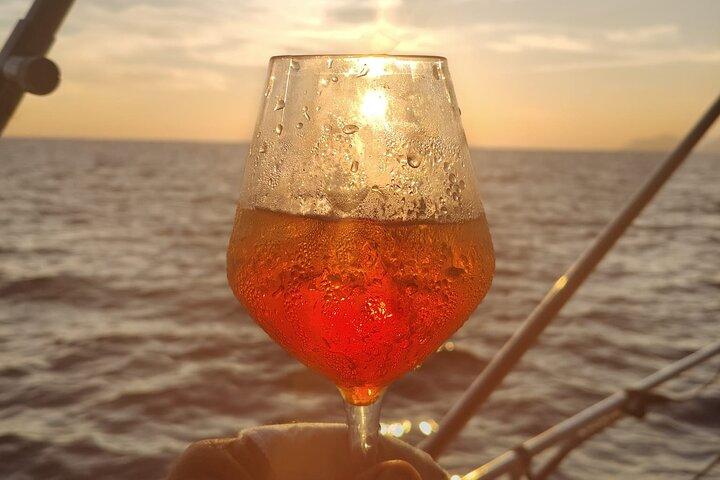 Aperitif on a boat at sunset, Porto Venere and islands