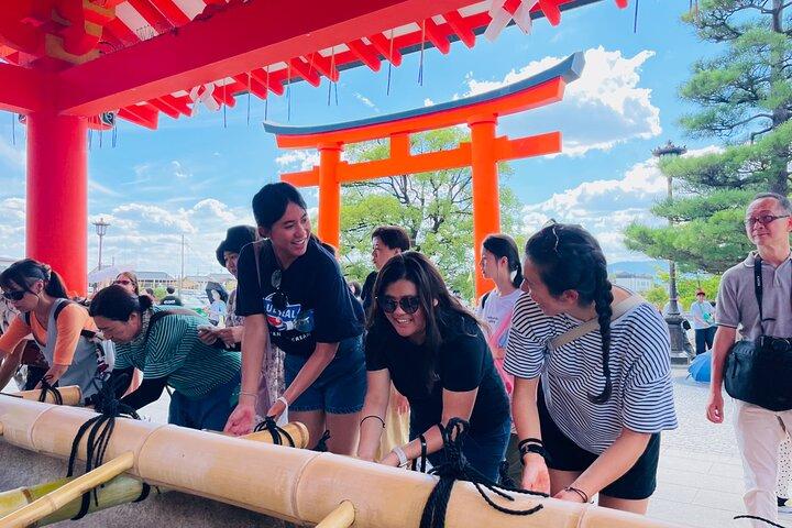 Pedal Adventure Kyoto's iconic landmarks on an e-bike tour