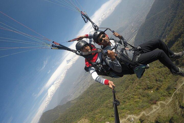 Paragliding Trip with River Rafting