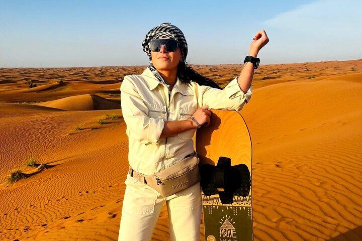 Dubai Dune Bashing Tour with Quad Bike, Sandboarding, Camel Ride