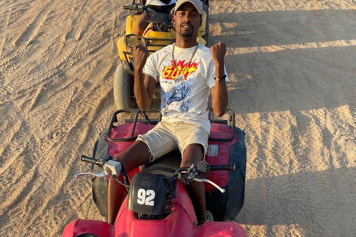 ATV Quad Bike in Desert Around The Pyramids