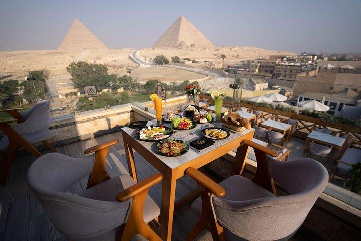 Dinner with Grand Egyptian Museum and Pyramids Views in Cairo