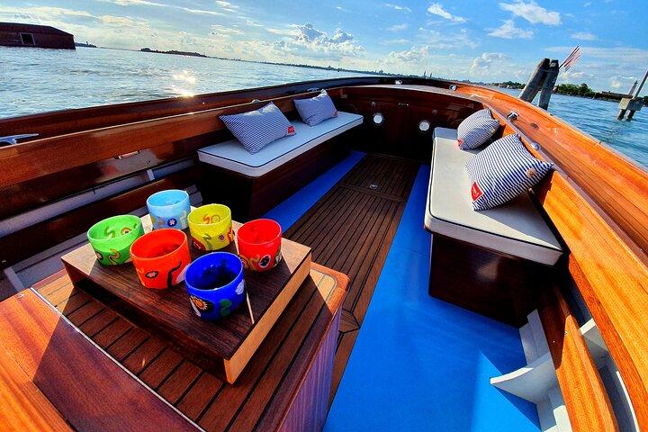Venice, Canals & history on a private boat tour !