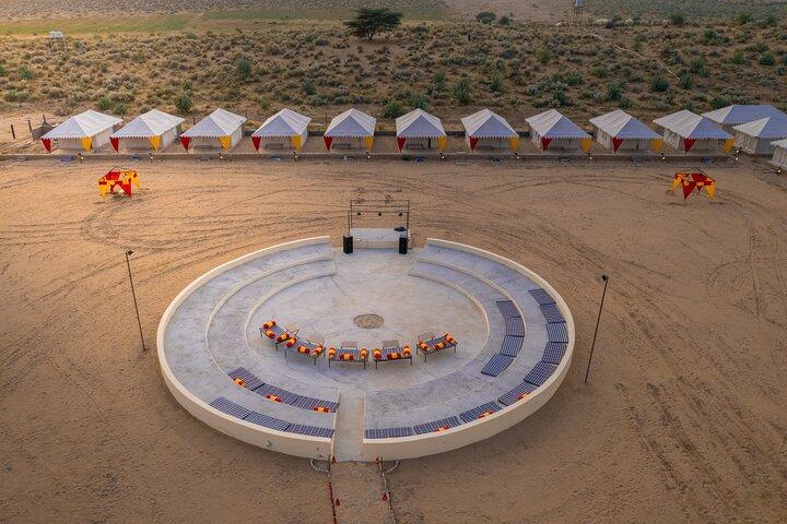 Overnight Stay in a luxury Camp with a cultural show & dinner.