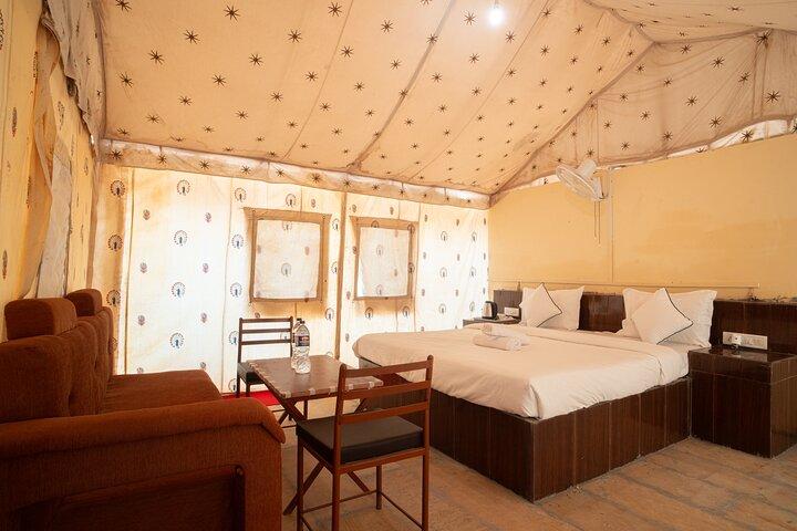 Overnight Stay in a luxury Camp with a cultural show & dinner.