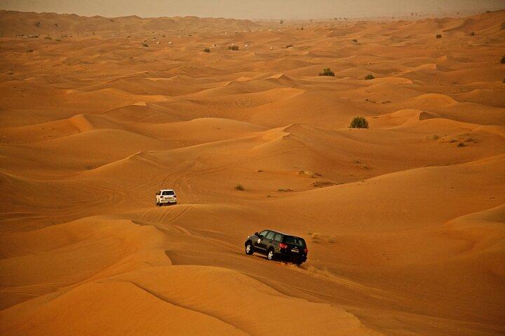 Dubai Desert Safari Camel Ride and ATV Bike with BBQ Dinner