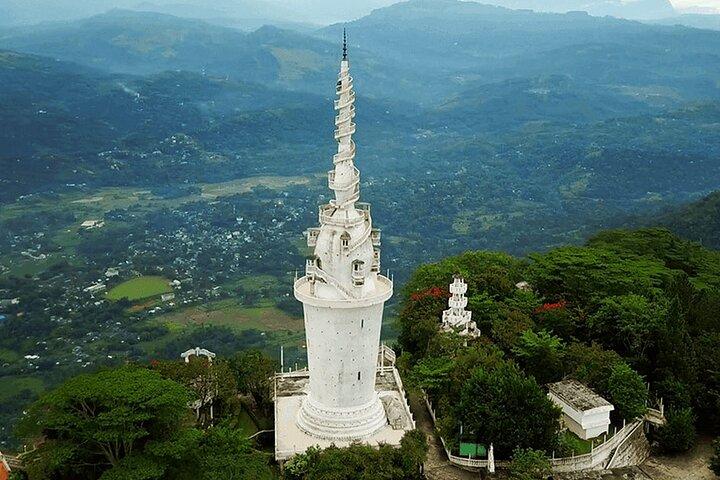 Peradeniya Garden, Ambuluwawa and Pinnawala Day Tour from Kandy