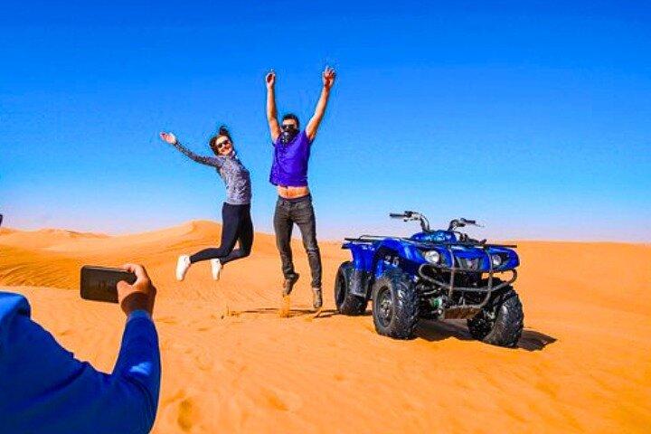 Dubai Premium Desert Safari with QuadBike Ride BBQ Dinner & Shows