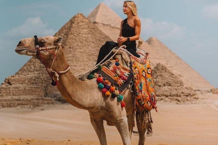 Exploring the Giza Pyramids , Sphinx , lunch , camel ride and Egyptian Museum