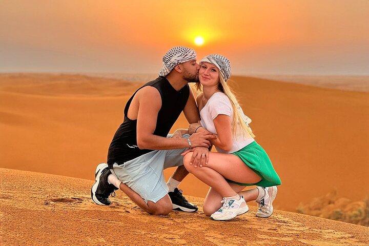 Private Red Dune Safari with BBQ, Camel Ride & Traditional Shows