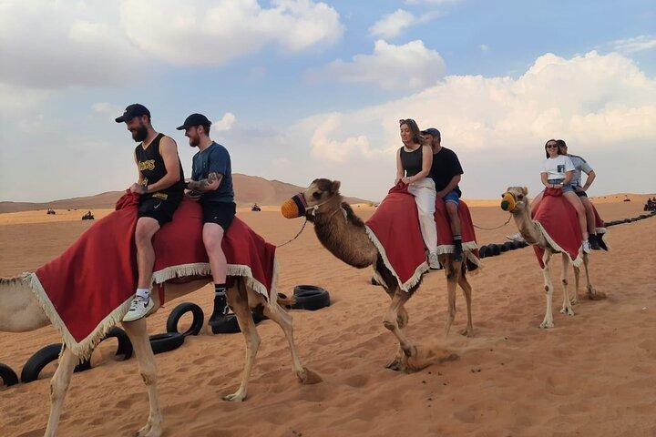 VIP desert safari Dubai: Quad Bike, BBQ Dinner With Private Car