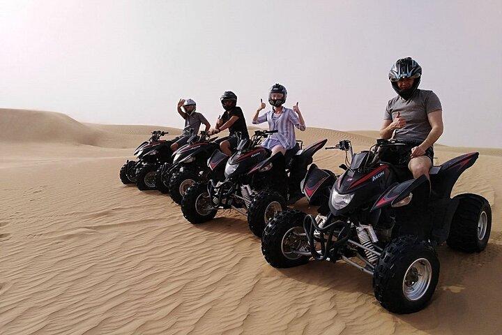 Sunset Evening Desert Safari with Dune Bashing Camel Ride & BBQ