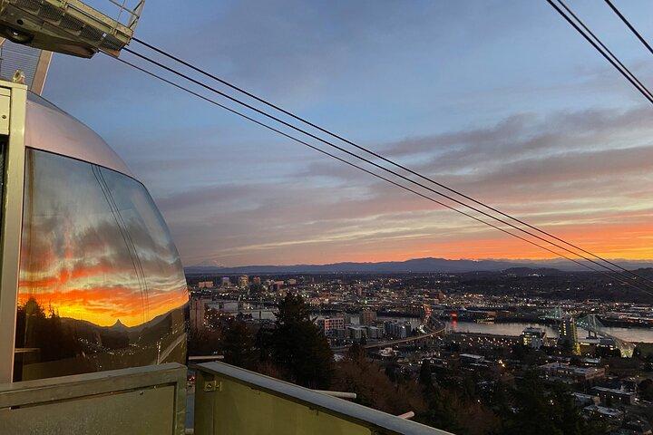 Aerial Tram Ride with Doughnuts near Sunrise in Portland Oregon