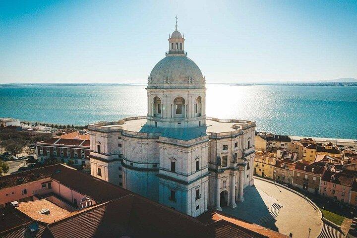 Discover Lisbon Secrets by Tuk Tuk around 7 Hills and Belém Coast