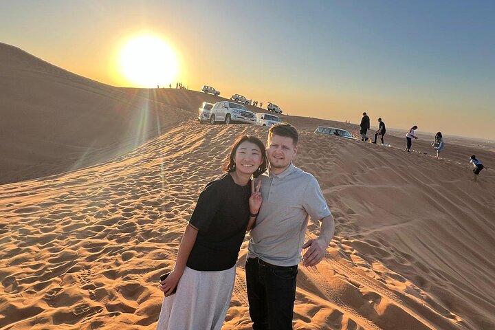 Dubai Desert Safari: Quad Bike, Sandboard, Camel Ride and BBQ