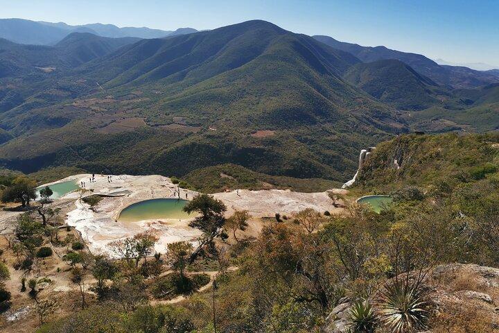 Enjoy Medio Día de Hierve el Agua and a mezcal factory.