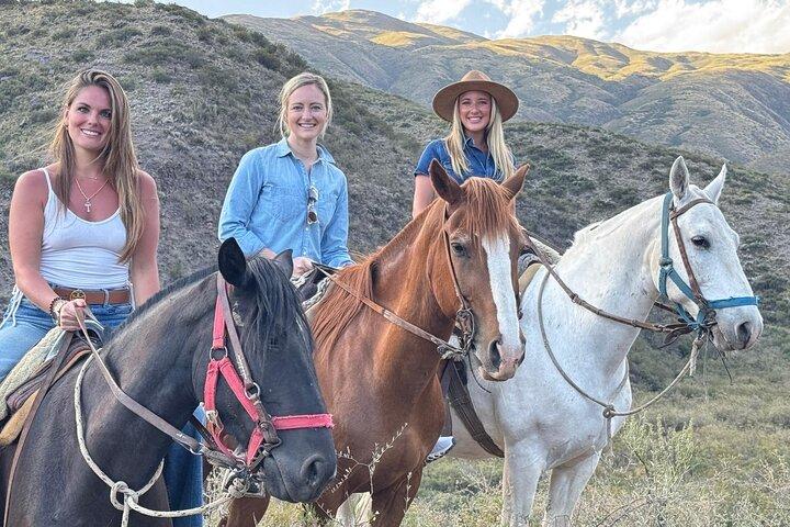 Horseback riding at sunset