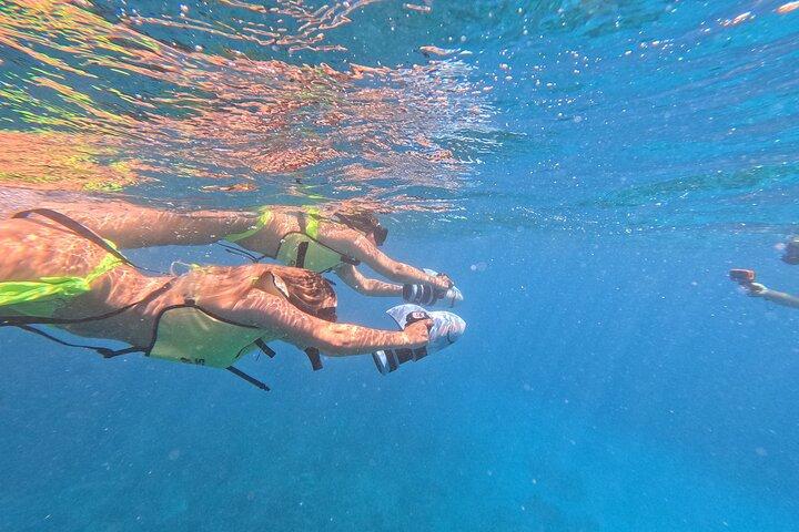 Snorkeling with Turtle/Water Scooter/Paddleboard Adventures Oahu