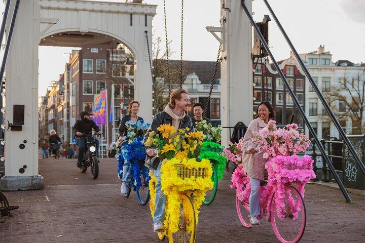 Explore Amsterdam canals on iconic Flower Bikes