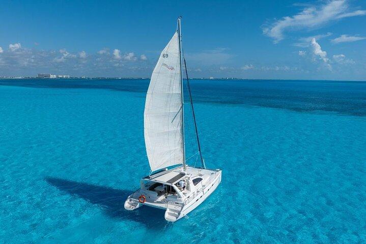 Isla Mujeres Day Tour with Catamaran, Snorkeling & Beach Club