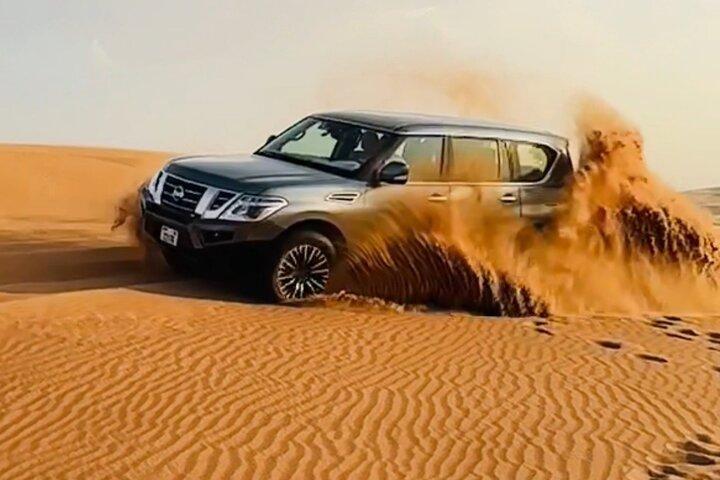 Dubai Evening Desert Safari With BBQ & Camel Ride