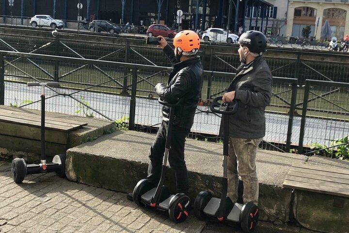 Unusual and ecological ride on a Segway and electric bike in Bayonne