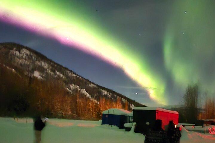 Spectacular Hot Spring Experience with Northern Lights