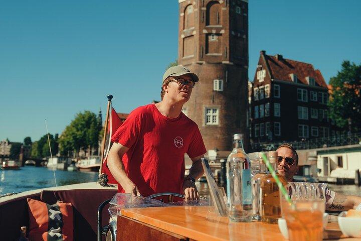 Amsterdam canal cruise in open boat – Guided tour