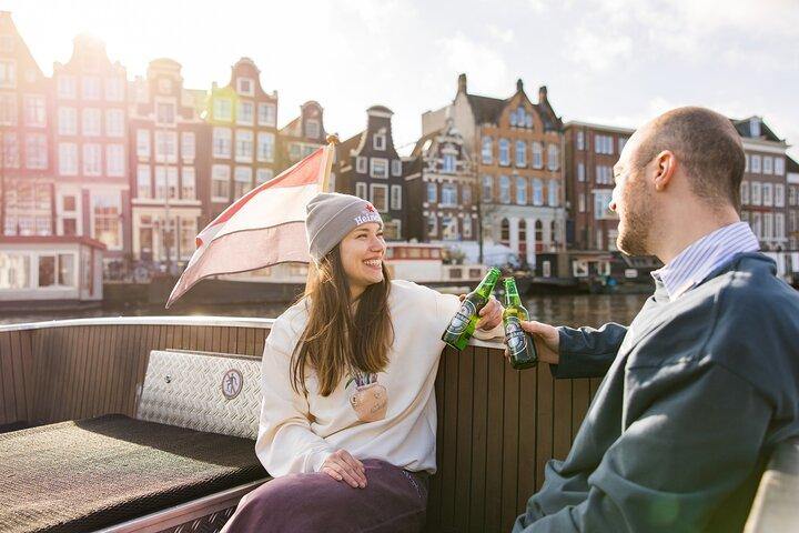 Amsterdam: Heineken Canal Cruise + Drinks & Live Guide