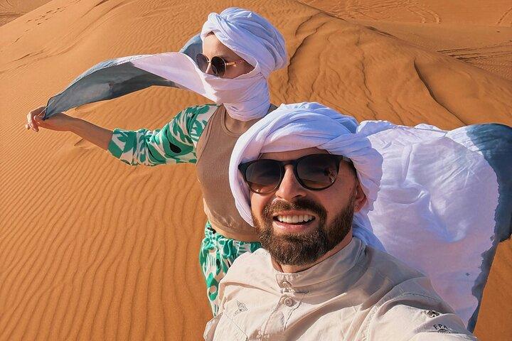 Private Abu Dhabi Morning Desert Safari, Camels, and Sandboarding
