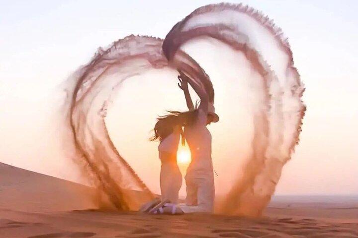Sunset Evening Desert Safari with Dune Bashing Camel Ride & BBQ