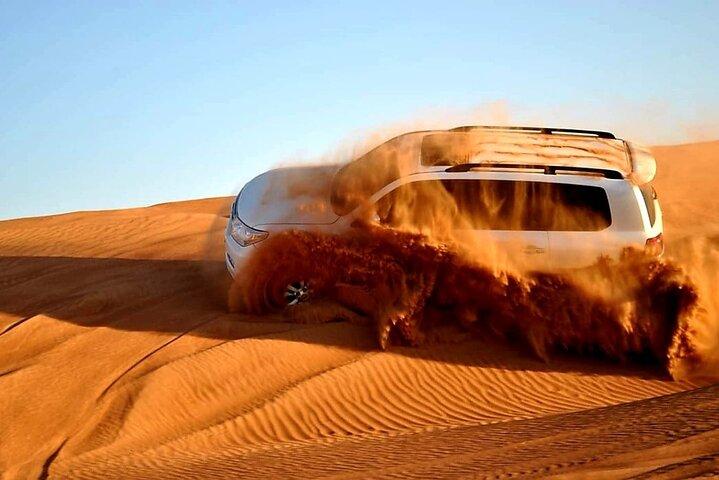 Dubai: Desert Safari, Quad Bike, Camel Ride and Sandboarding