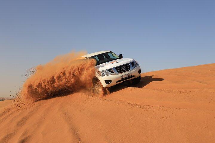Dubai Desert Safari with BBQ, Camel Ride, Sand Board, Live Shows