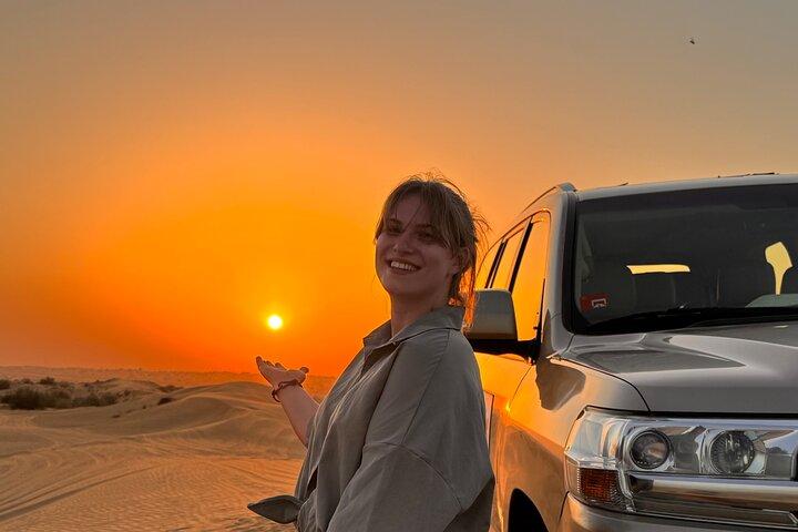 Premium Desert Safari Dubai , Camel Ride Sand board , BBQ & Shows
