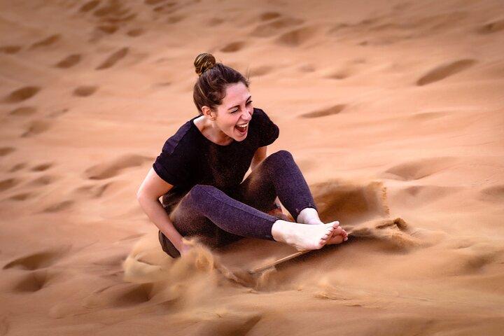 Abu Dhabi: Desert Safari with Dune Bashing, SandBoarding & BBQ