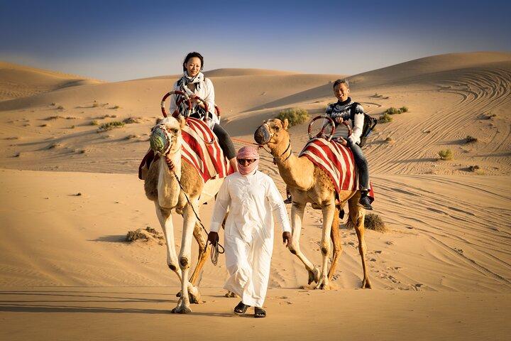 Abu Dhabi: Desert Safari with Dune Bashing, SandBoarding & BBQ