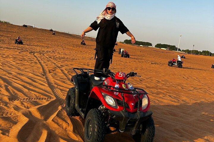 Dubai desert safari with BBQ dinner, camel ride & dune Bashing