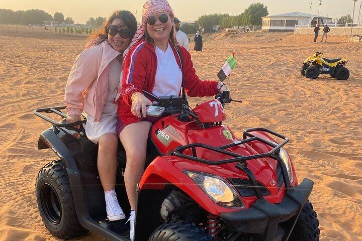 Dubai desert safari with BBQ dinner, camel ride & dune Bashing