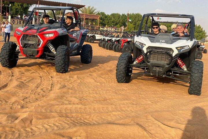 Dubai desert safari with BBQ dinner, camel ride & dune Bashing