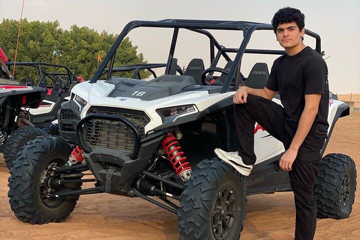 Dubai desert safari with BBQ dinner, camel ride & dune Bashing